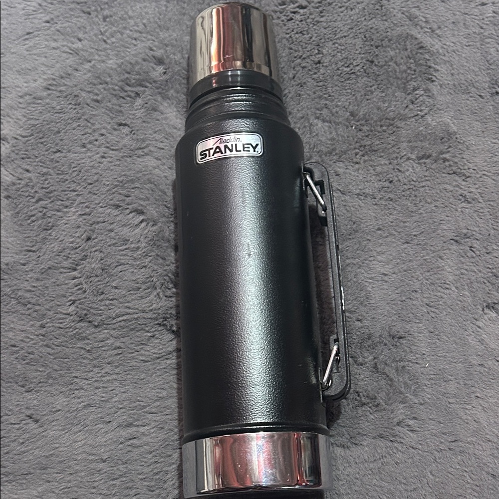 Stanley Black and Silver Vacuum Bottle vintage.  In great condition